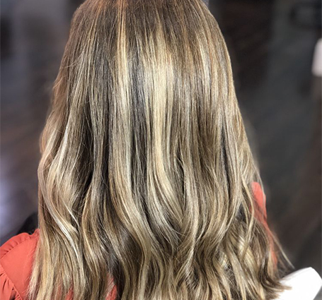 Before and after comparison of frizzy versus smooth keratin-treated hair