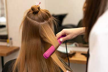 Collage of haircut, color, and styling services displayed as salon offerings